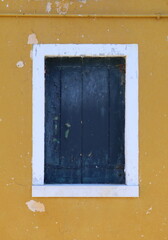 Typical renaissance window in Burano, Italy
