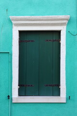 Typical renaissance window in Burano, Italy