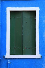 Typical renaissance window in Burano, Italy