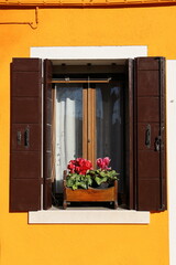 Typical renaissance window in Burano, Italy