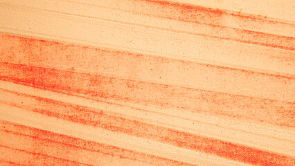 Detail of cream and orange paint texture