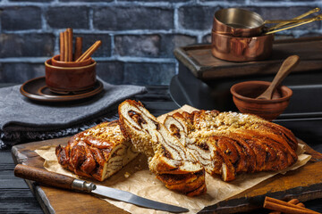 Cinnamon braided bread topped with pearl sugar