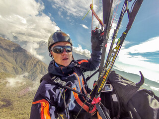 Paraglider on the top of the mountain