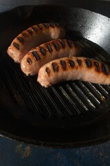 Preparation technique: fry pork sausages in a cast iron skillet worm light.