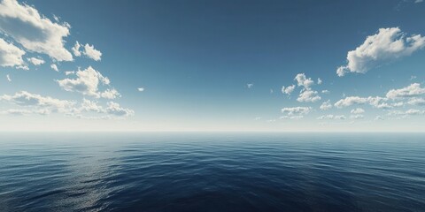 Vast Tranquil Ocean Under Clear Blue Sky with Gentle Waves and Soft White Clouds Reflecting Calmness and Serenity in Nature's Beauty