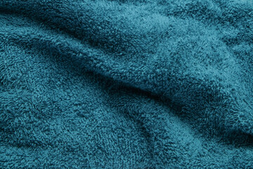 Wavy and wrinkled texture background of blue towel fabric. Smooth and soft towel fabric. For graphic design, 3D rendering or banner background