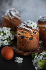 Easter cakes with raisins and eggs on a dark background. Ontario, Canada.