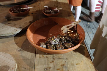 Roman meat with pepper and pine nut