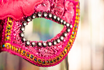Carnival mask, beautiful carnival mask with colorful curtain background, selective focus.