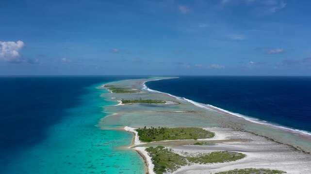 One of the biggest atoll in the world. Fakarava islands from above. Paradise in the middle of Pacific ocean. Atoll near Tahiti in French Polynesia