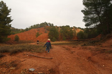 Mother and small son on a hike in Red Canyon near Teruel in Spain