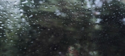 Texture of raindrops on car window