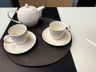 Cups and kettle for tea. Mockup. Tea party. Coffee cups
