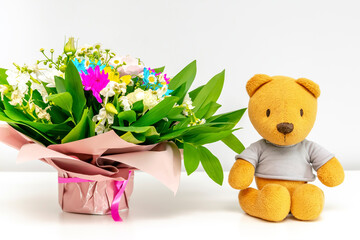 Colorful beautiful flowers bouquet,teddy bear gift.Spring floral,Flower shop,florist...