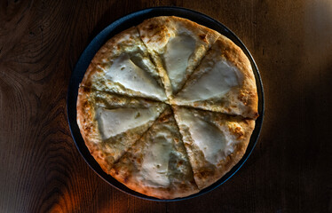 Khachapuri on a plate, traditional Caucasian dish
