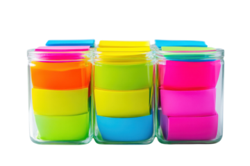 Colorful sticky notes arranged in jars create a vibrant workspace setting at bright daylight isolated on transparent background