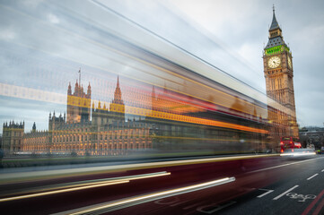 Traffic in London with light trails of passing bus