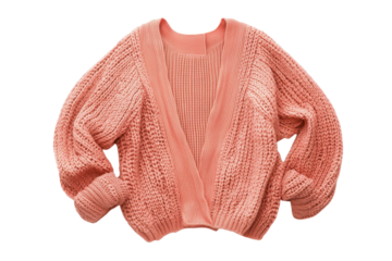 Cozy coral knit cardigan laid out on a soft background, perfect for autumn styling isolated on transparent background