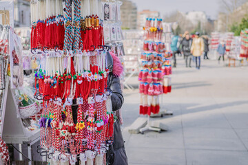 Martenitsa stand at outdoor market. Spring decoration, amulet of wool or threads, which is tied on the first day of March. Symbol of health, happiness, protection from evil eye, damage, evil spirits