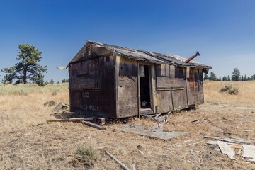 Dilapidated wooden shack with a 