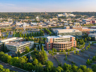 Aerial view of Spokane, Washington, showcasing the city's urban landscape, architecture, and green...