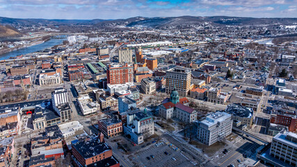 Binghamton, NY, USA - 03-02-2025: Winter afternoon aerial photo over downtown Binghamton, NY.