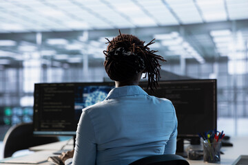 Programmer in data center using artificial intelligence computing simulating human brain thought...