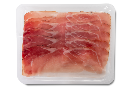 Slices of speck ham packaged in plastic tray isolated. Typical smoked ham from South Tyrol, Italy