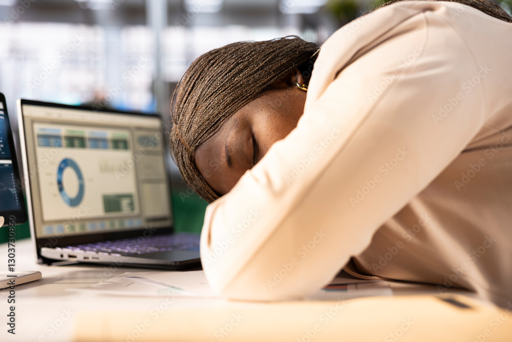 Poster exhausted businesswoman falling asleep at desk while monitoring and analyzing sales performance metr