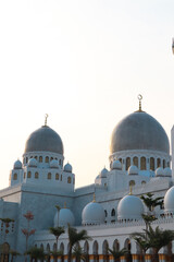 Islamic House of Prayer in a City White Domes Under a Bright Sky  Solo, Indonesia. Surakarta