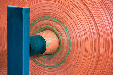 The weaving workshop machinery of a certain packaging factory is running, producing new fiber ropes and fiber bags