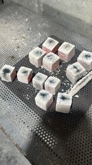 Fire burning from coconut charcoal briquette for business production	