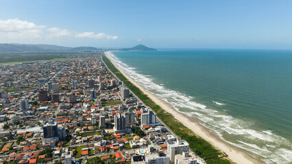 Aerial drone view of the city of Navegantes, Brazil, showcasing its vast coastline.