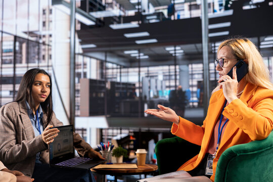 Female leader contacting partners via smartphone conference call, discussing about latest developments and investments. Woman business manager speaking on remote phone call, decision maker.