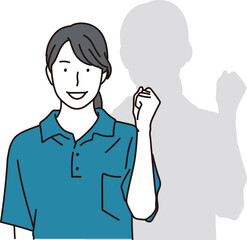 ガッツポーズをする女性の介護士