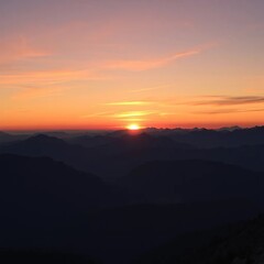 Obraz premium Breathtaking vistas of a sunset over mountain ranges, sunrise, nature