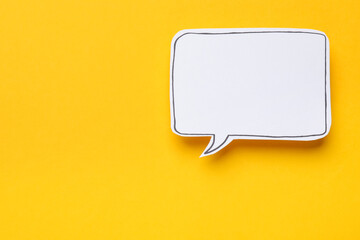 Blank speech bubble on yellow background, top view. Space for text