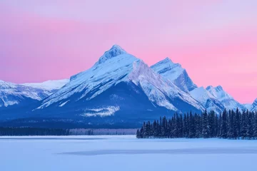 Fototapete Rund Majestic snow covered mountains at dawn with a pink sky and frozen lake, creating a serene winter landscape for nature lovers and photographers © VICHIZH