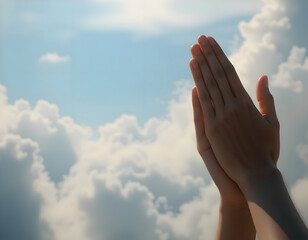Hands Praying Towards Sky with Clouds for Hope or Gratitude