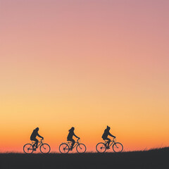 Silhouette of three cyclists riding at sunset