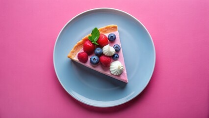 A delightful slice of pink berry tart, adorned with fresh raspberries, blueberries, and delicate meringue swirls, rests elegantly on a light blue plate against a vibrant pink backdrop.
