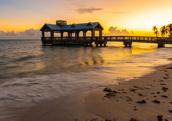 Sunset on Tourists at Wooden Pavilion on Hidden Beach, Key West Florida, USA