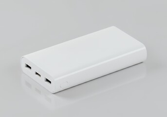 Portable White Power Bank Close-up for Charging Electronics on Grey