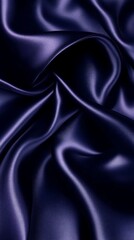 Obraz premium Deep indigo silk fabric with flowing folds and subtle reflections