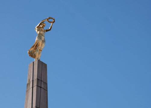 The Golden Lady (G&euml;lle Fra) on top of the Monument of Remembrance from 1923 to commemorate the Luxembourgers who perished in the First World War on Constitution Square in Luxembourg City Centre	