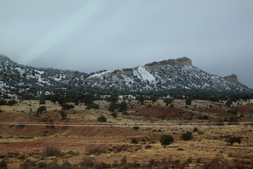 Landscape photo of the snow covered red rocks of the Navajo land in northern Arizona