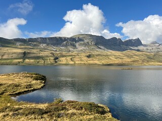 The alpine lake Tannensee or Tannen Lake in the Uri Alps mountain massif, Kerns - Canton of Obwalden, Switzerland (Kanton Obwald, Schweiz)