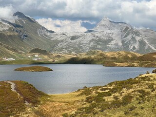 Fototapeta premium The alpine lake Tannensee or Tannen Lake in the Uri Alps mountain massif, Kerns - Canton of Obwalden, Switzerland (Kanton Obwald, Schweiz)