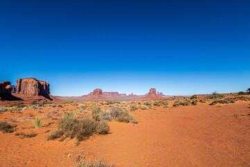 Beautiful Monument Valley seen from Monument Valley Scenic Drive. The drive is a 17-mile loop on a rough dirt road in the valley.