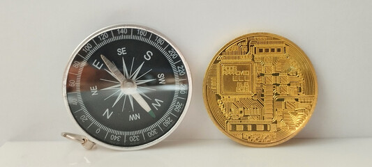 Navigating cryptocurrency trends with compass and bitcoin coin digital finance modern environment close-up view
